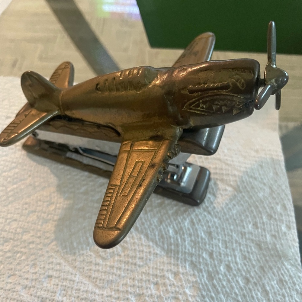 Mid century brass- plated mini stapler Replica of P-40 Warhawk airplane.